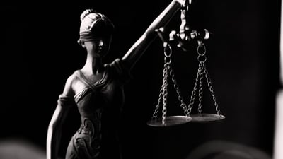 blind justice holding the scales in balance for ethical AI
