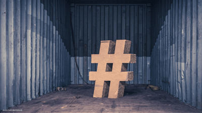cardboard hashtag in a shipping container
