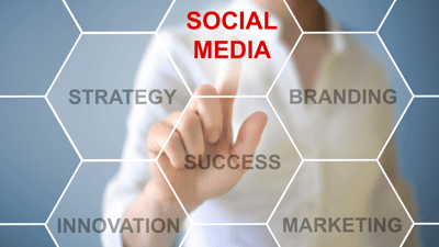 social media strategy blocks with hand 