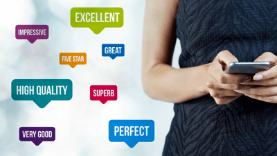 woman with cell phone black dress quality words