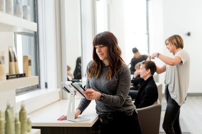 Woman reading an iPad