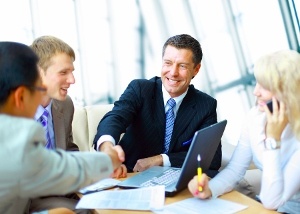 bigstock-Business-people-shaking-hands--13872659_300x214-1.jpg