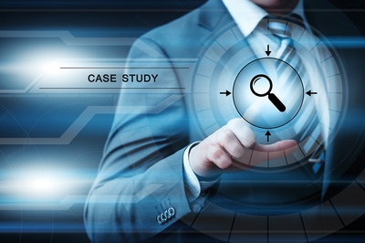 case study of business benefits Person pointing to a magnifying glass.