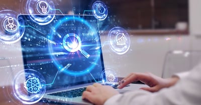 Person typing on laptop