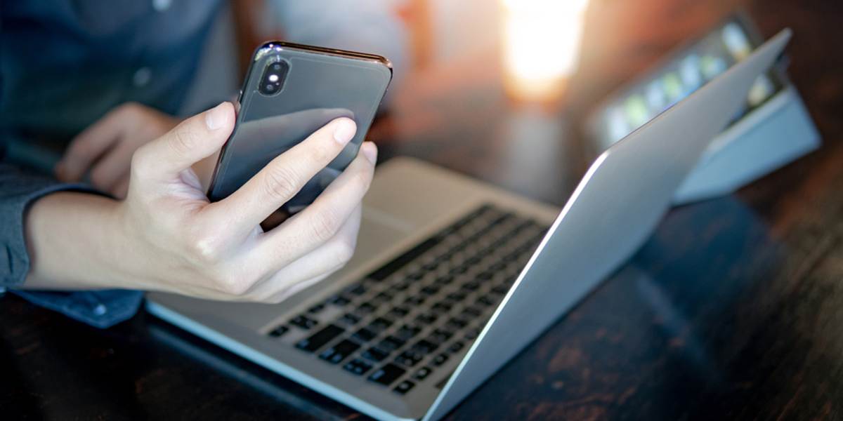 Laptop computer and phone.