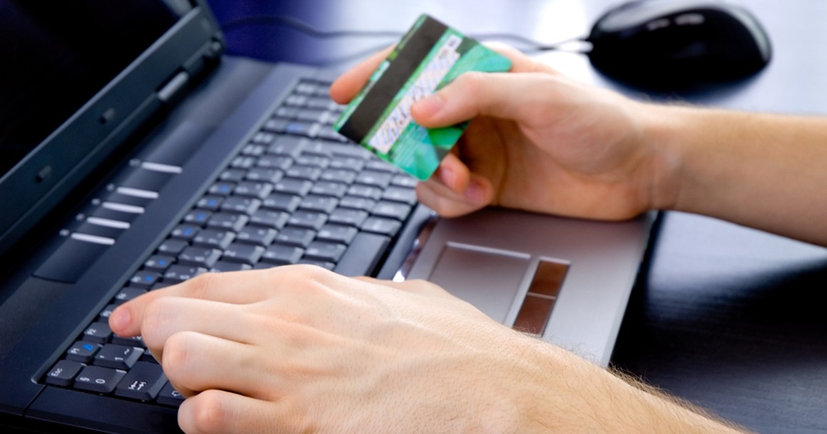Making an online payment using a credit card.