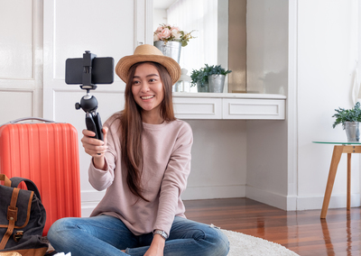 Influencer taking a selfie.
