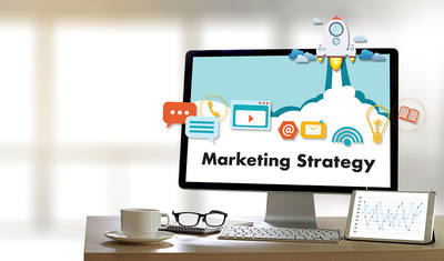 Desktop computer screen with marketing strategy displayed.